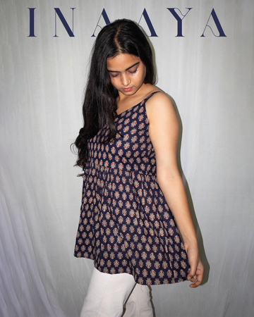 Inaya Sleeveless Flared Top